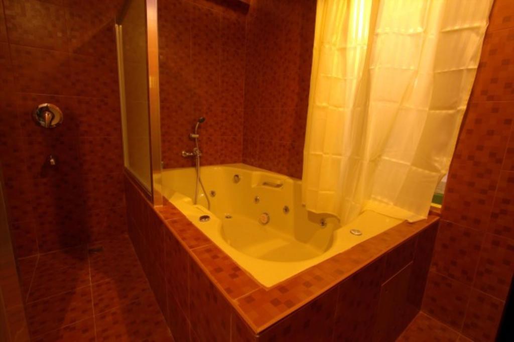 ไอค่อน โฮเต็ล มากาปากัล Hotel มะนิลา ห้อง รูปภาพ