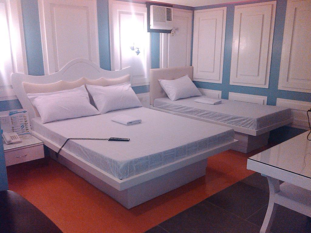 ไอค่อน โฮเต็ล มากาปากัล Hotel มะนิลา ห้อง รูปภาพ