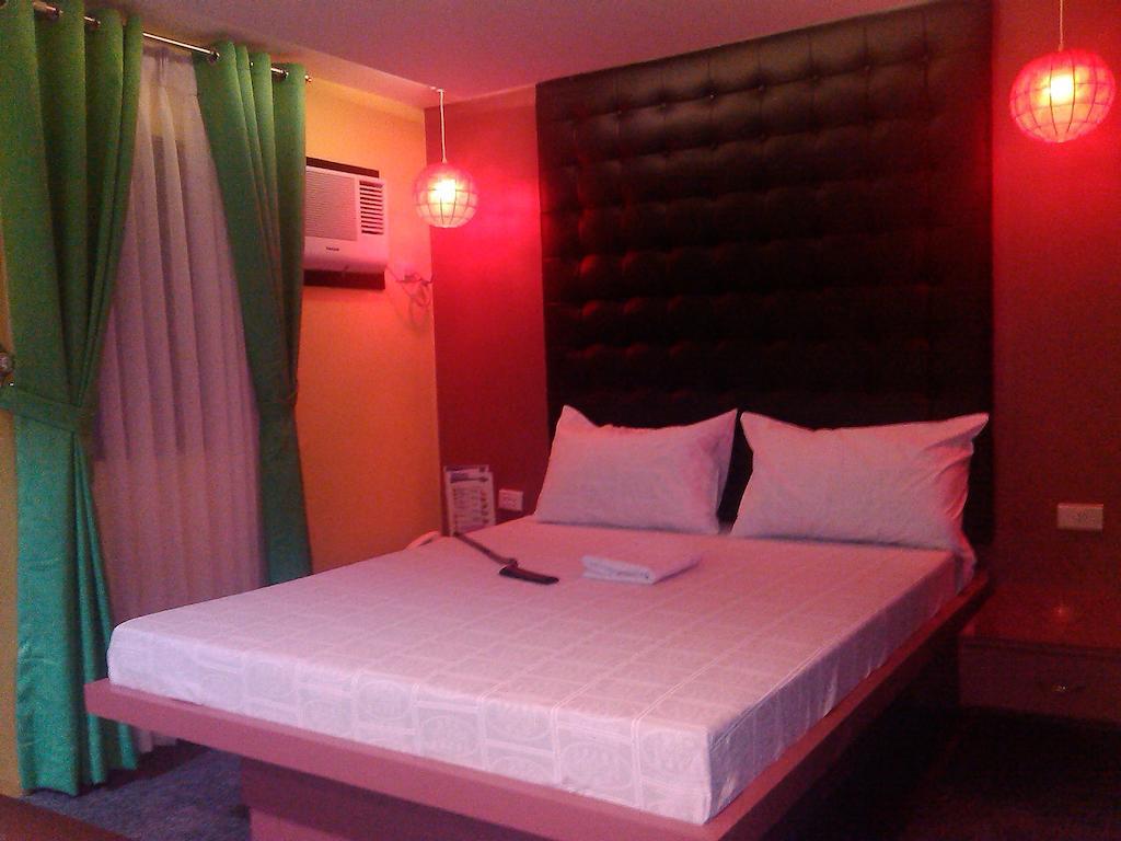 ไอค่อน โฮเต็ล มากาปากัล Hotel มะนิลา ห้อง รูปภาพ