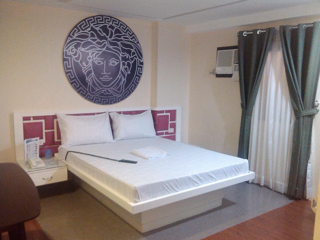 ไอค่อน โฮเต็ล มากาปากัล Hotel มะนิลา ห้อง รูปภาพ